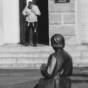 Prayer in Bronze and Flesh